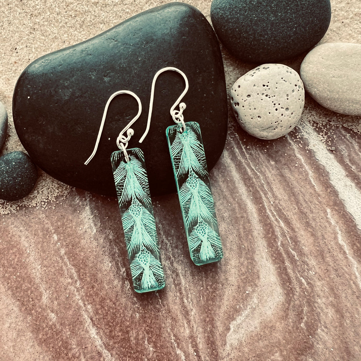Turtle Patterned earring in long bar - showing details in semi transparent green.