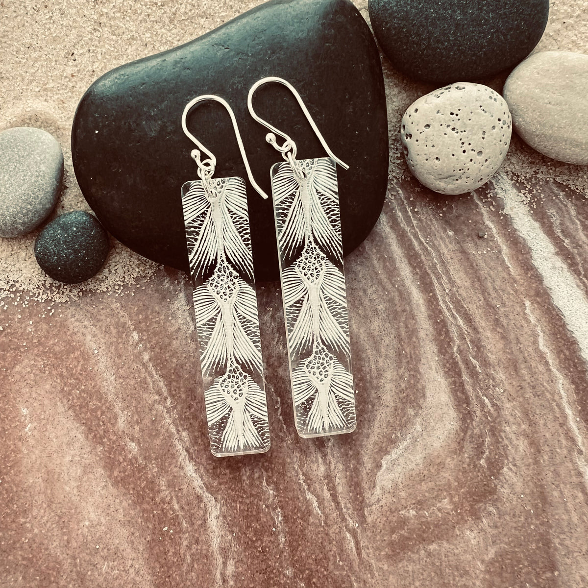 Turtle Patterned earring in long bar - showing details in clear white.