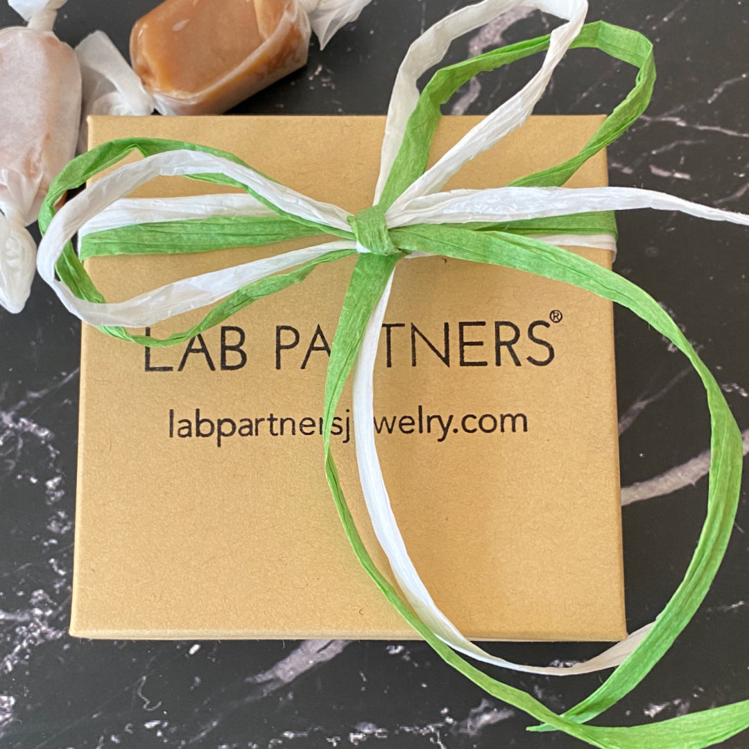 Lab Partners Jewelry kraft colored box with logo and green and white bow